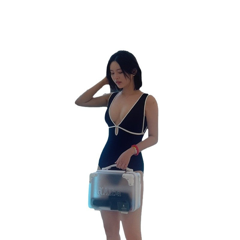 Ladies stylish one-piece swimsuit with fashionable contrasting elements Ivyshape