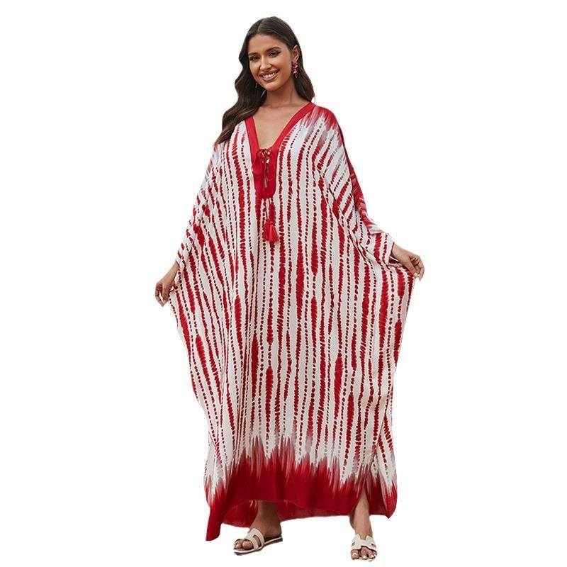 Women's beach kaftan with elegant floral design and wide silhouette Ivyshape