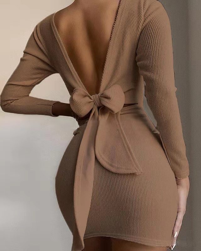 Women fitted mini dress with deep V-neck and bow detail Ivyshape
