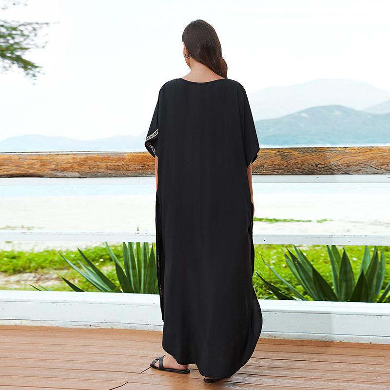 Women's beach cover-up with elegant embroidery and flowing cut Ivyshape