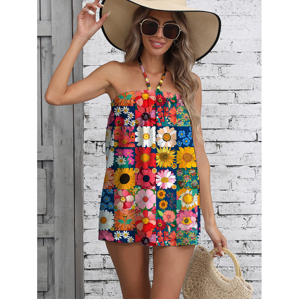 Ladies summer jumpsuit with colorful floral pattern and stylish strap design Ivyshape