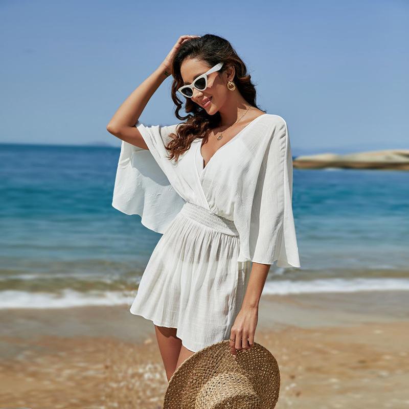 Women’s beach dress with voluminous sleeves and deep V-neck Ivyshape