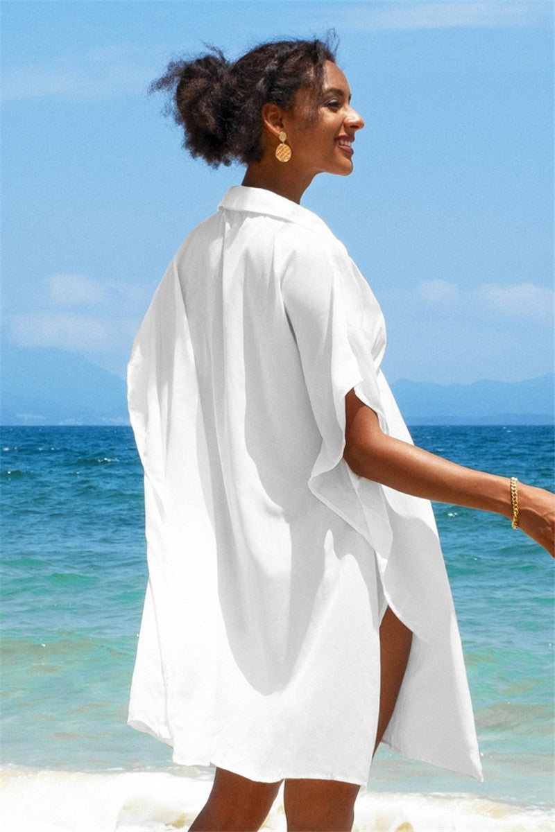 Women's beach blouse with wide sleeves and decorative button design Ivyshape