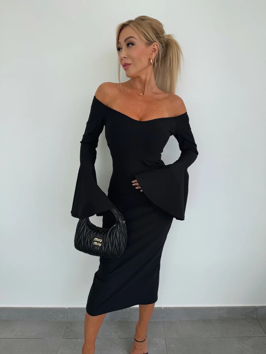 Women's sheath dress with off-shoulder ruffled sleeves and fitted silhouette Ivyshape