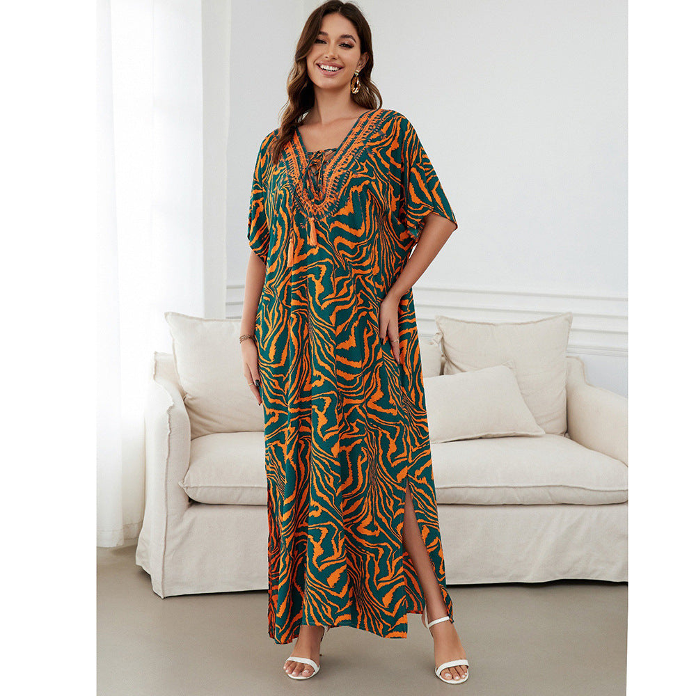 Women's maxi dress with colorful animal motif and elegant V-neck Ivyshape