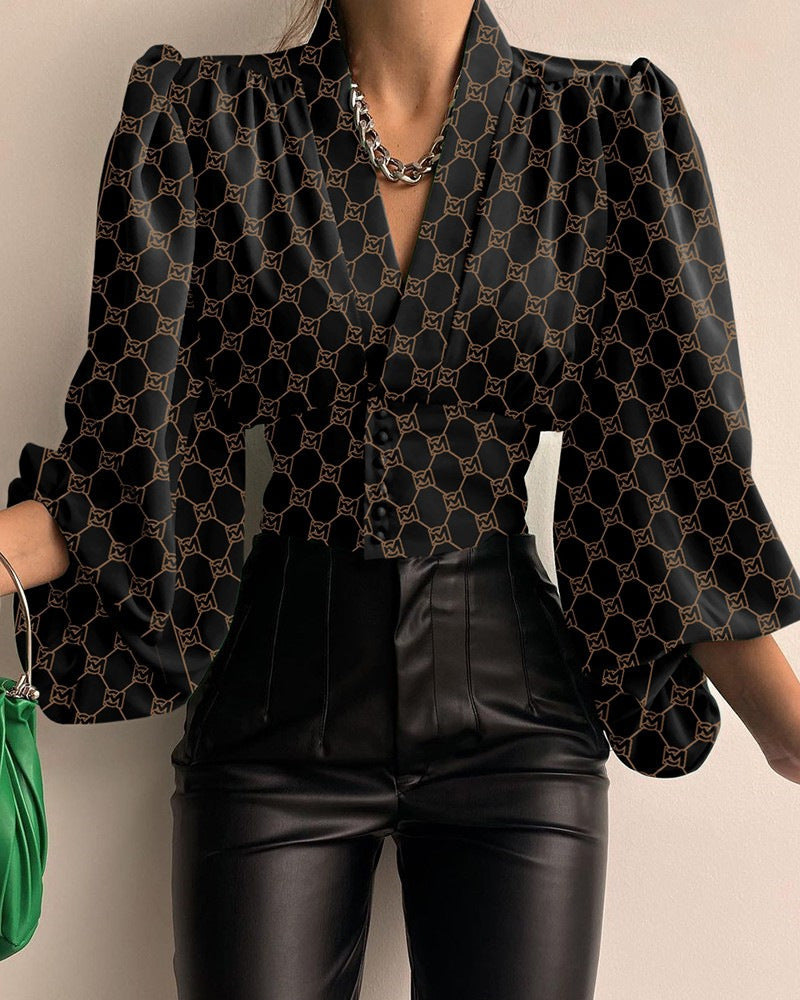Nova - Blouse with geometric print and puff sleeves