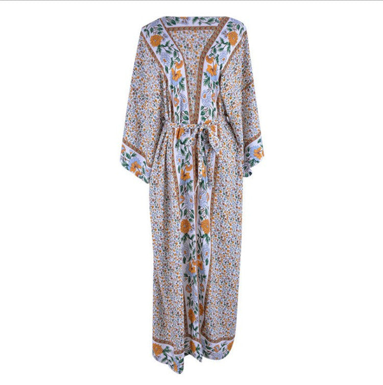 Women's beach robe with colorful floral pattern and elegant cut Ivyshape