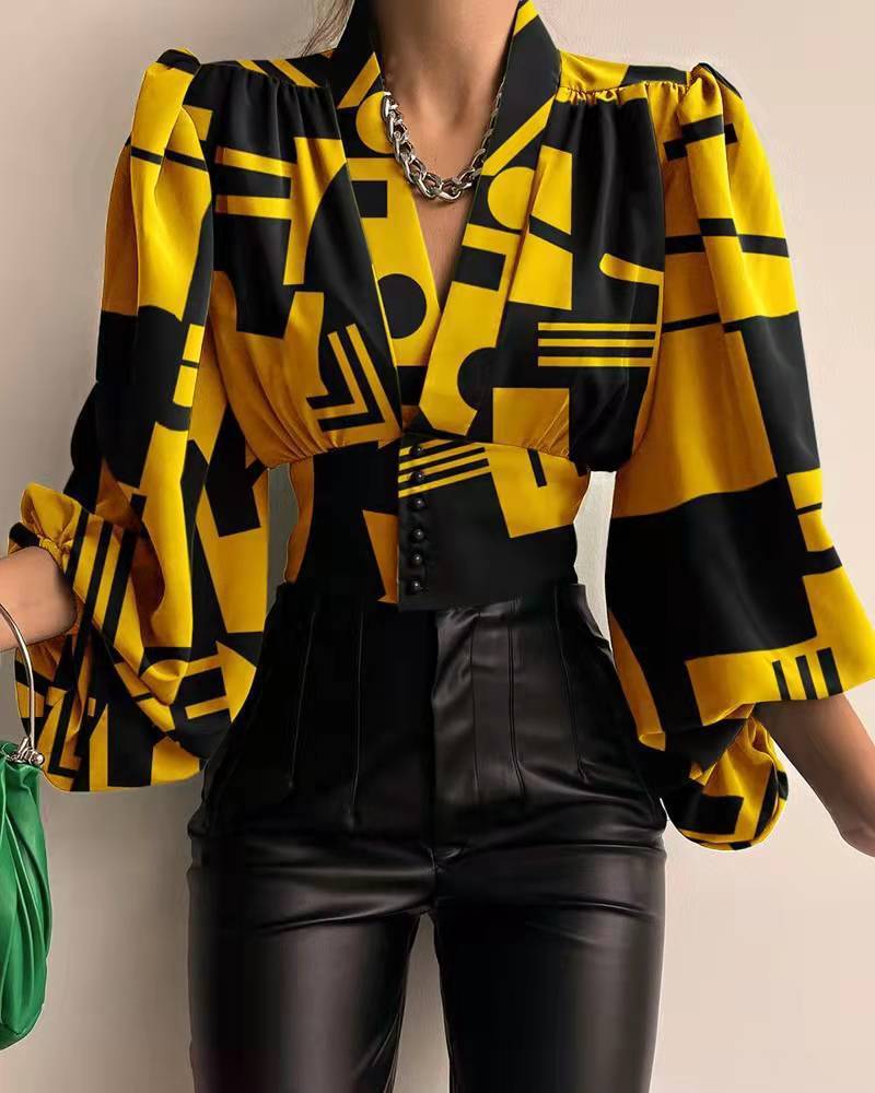 Nova - Blouse with geometric print and puff sleeves