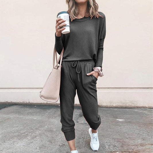 Women casual jumpsuit made of soft flowing material with practical pockets and rib knitted details Ivyshape