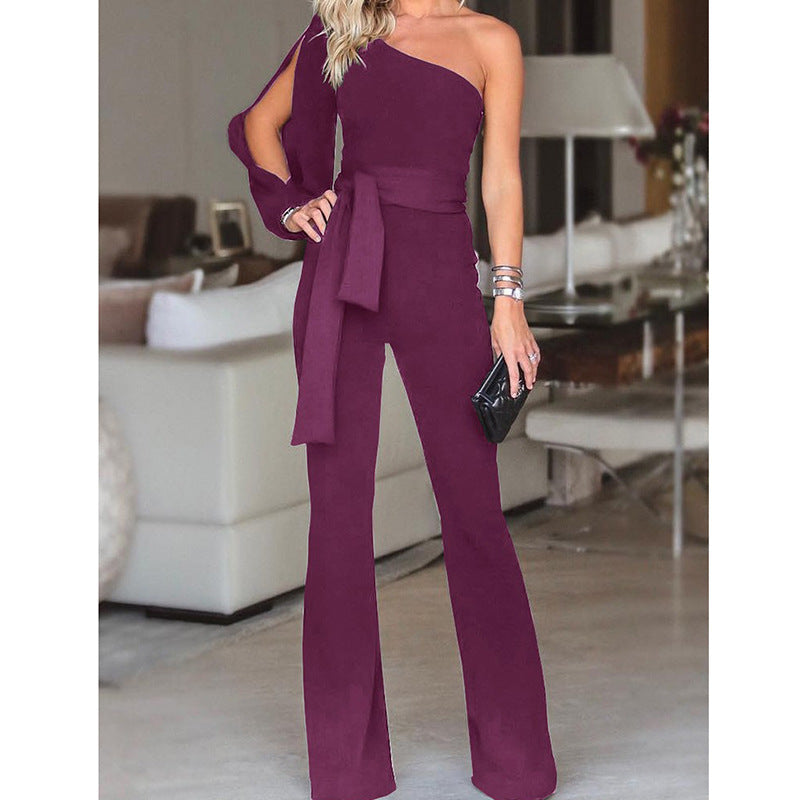 Daniela - Elegant asymmetrical jumpsuit with bow and flared legs