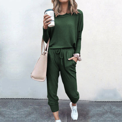 Women casual jumpsuit made of soft flowing material with practical pockets and rib knitted details Ivyshape