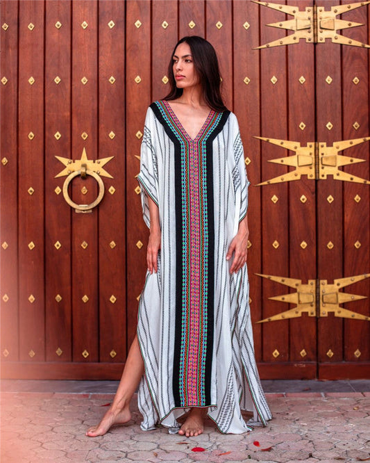 Women's beach dress with elaborate V-neck and colorful pattern Ivyshape