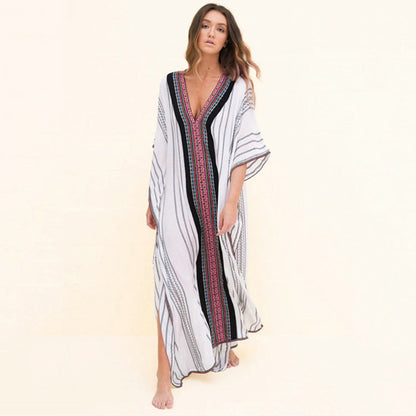 Women's beach dress with elaborate V-neck and colorful pattern Ivyshape