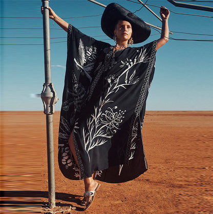Women’s beach dress with artistic floral design and side slits Ivyshape