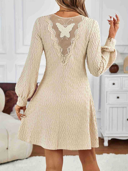 Giada | Abito beige con texture lavorata e scollo a V