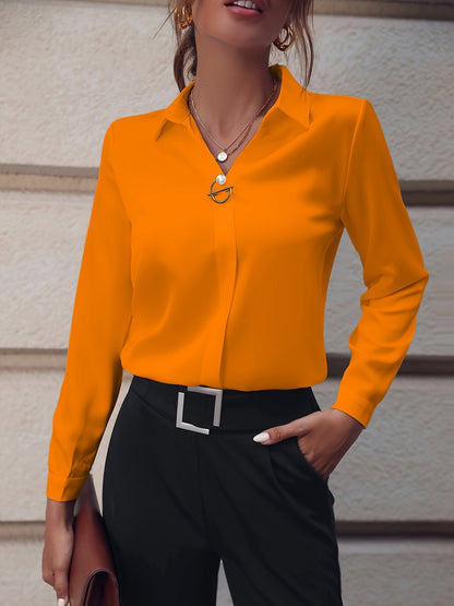 Renata - Blusa fucsia de manga larga
