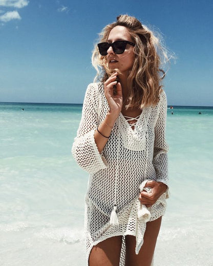 Ladies elegant beach poncho with sophisticated net design and fringed accents Ivyshape