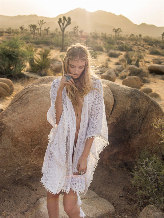 Women's elegant crochet beach cover-up with playful tassels Ivyshape