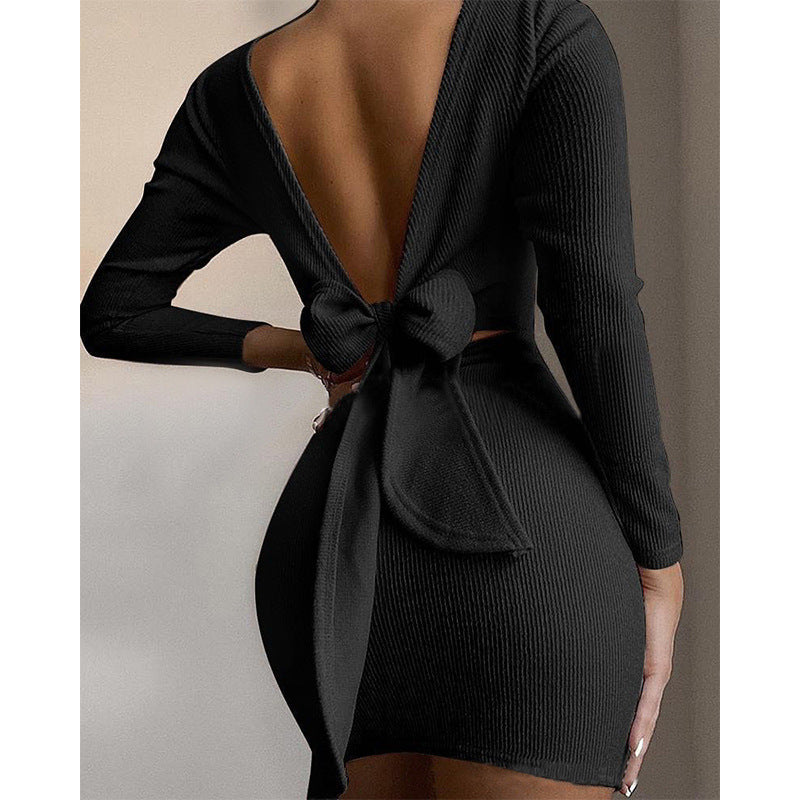 Women fitted mini dress with deep V-neck and bow detail Ivyshape