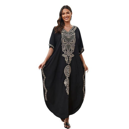 Women's beach cover-up with elegant embroidery and flowing cut Ivyshape