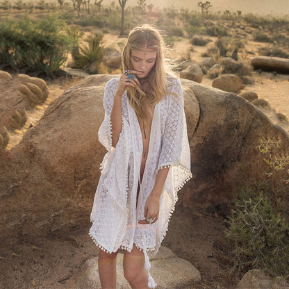 Women's elegant crochet beach cover-up with playful tassels Ivyshape