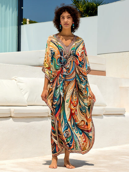 Ladies beach kaftan with cheerful floral design and loose fit Ivyshape