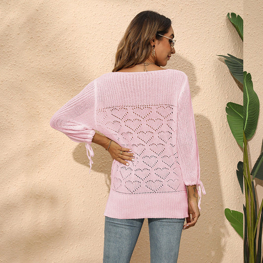 Ladies knit top with heart-shaped hole pattern and playful sleeves Ivyshape