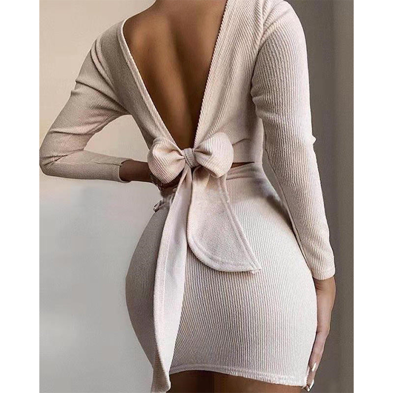 Women fitted mini dress with deep V-neck and bow detail Ivyshape