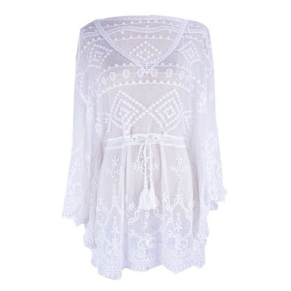 Ladies airy crochet beach cover-up with delicate flower appliqués Ivyshape