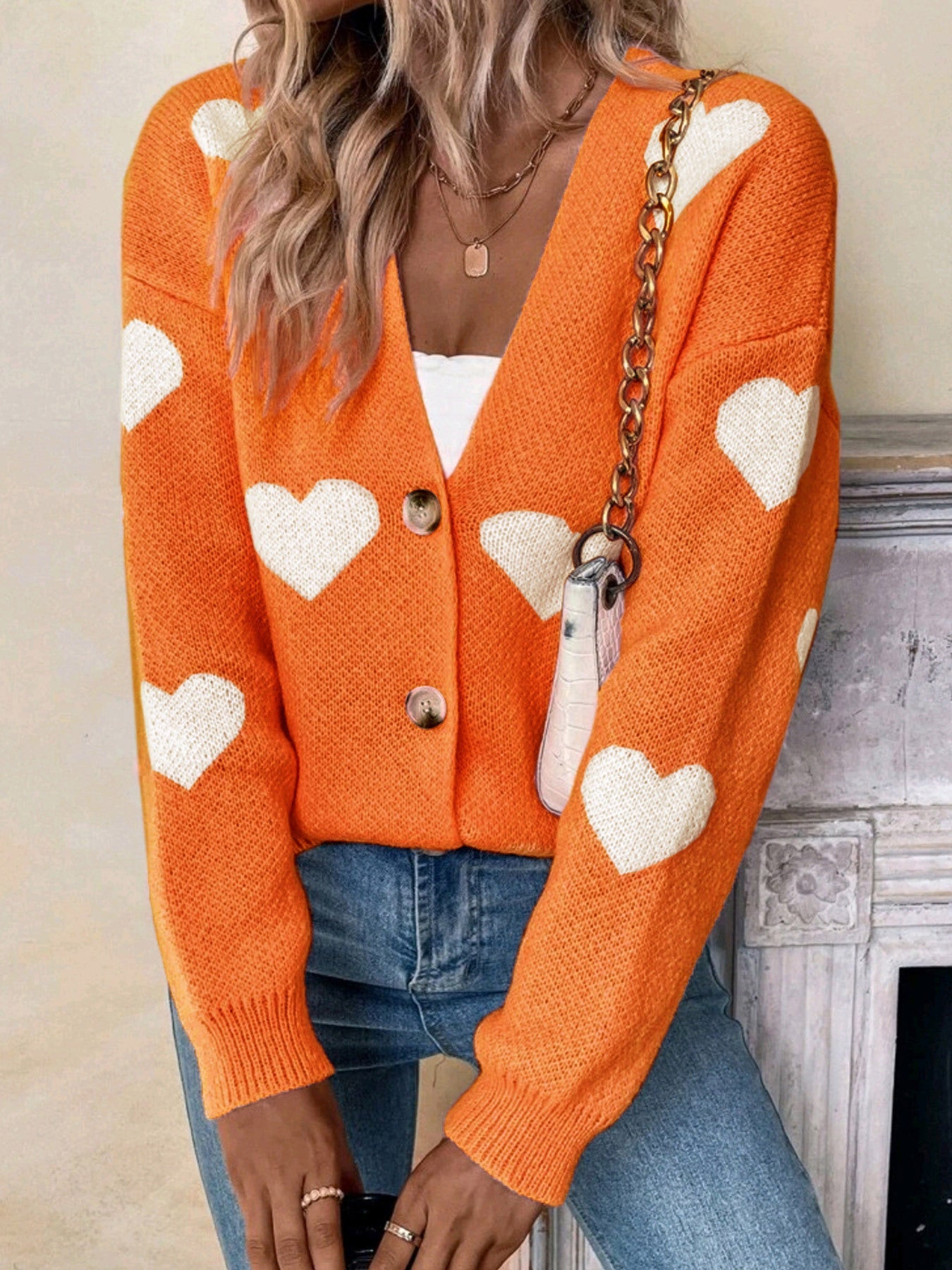 Ladies knitted cardigan with heart pattern and button placket Ivyshape