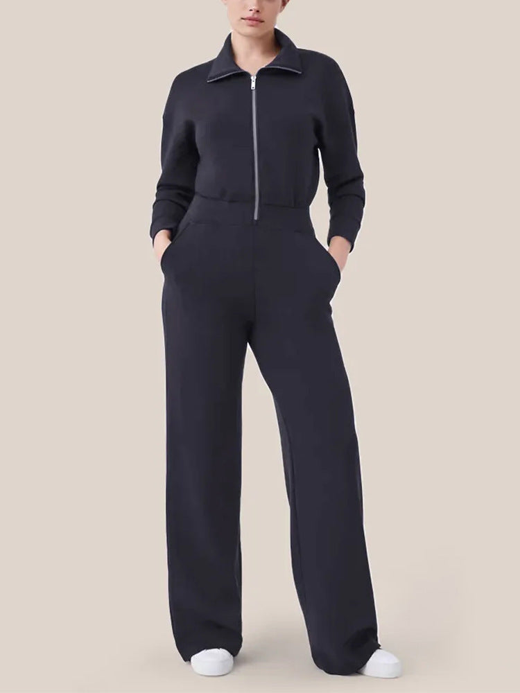Women's sporty jumpsuit with high collar and practical pockets Ivyshape