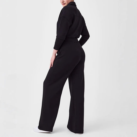 Women's sporty jumpsuit with high collar and practical pockets Ivyshape