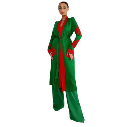 Women's knitted coat with intricate embroidery and modern button design Ivyshape