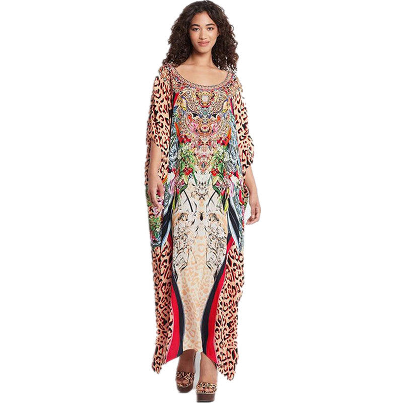 Ladies beach dress in stylish animal print and elegant accents Ivyshape