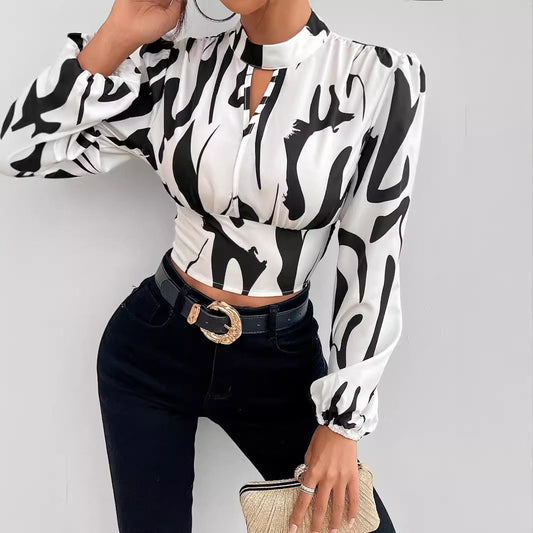 Women's blouse with voluminous sleeves and modern cut-out Ivyshape
