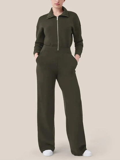 Women's sporty jumpsuit with high collar and practical pockets Ivyshape