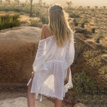 Women's elegant crochet beach cover-up with playful tassels Ivyshape