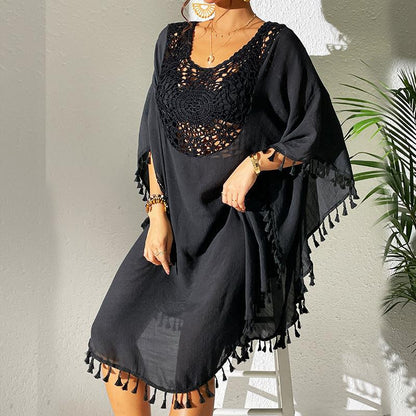 Women's lightweight beach cover-up with intricate crochet accents and fringe details Ivyshape
