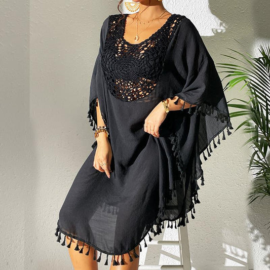 Women's lightweight beach cover-up with intricate crochet accents and fringe details Ivyshape