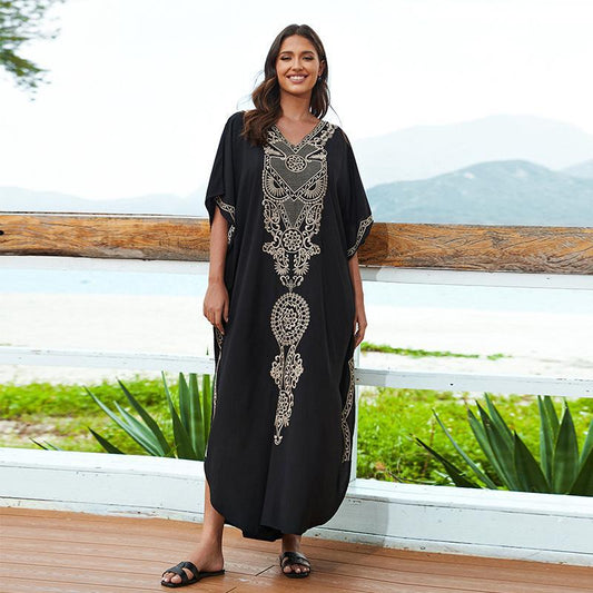 Women's beach cover-up with elegant embroidery and flowing cut Ivyshape