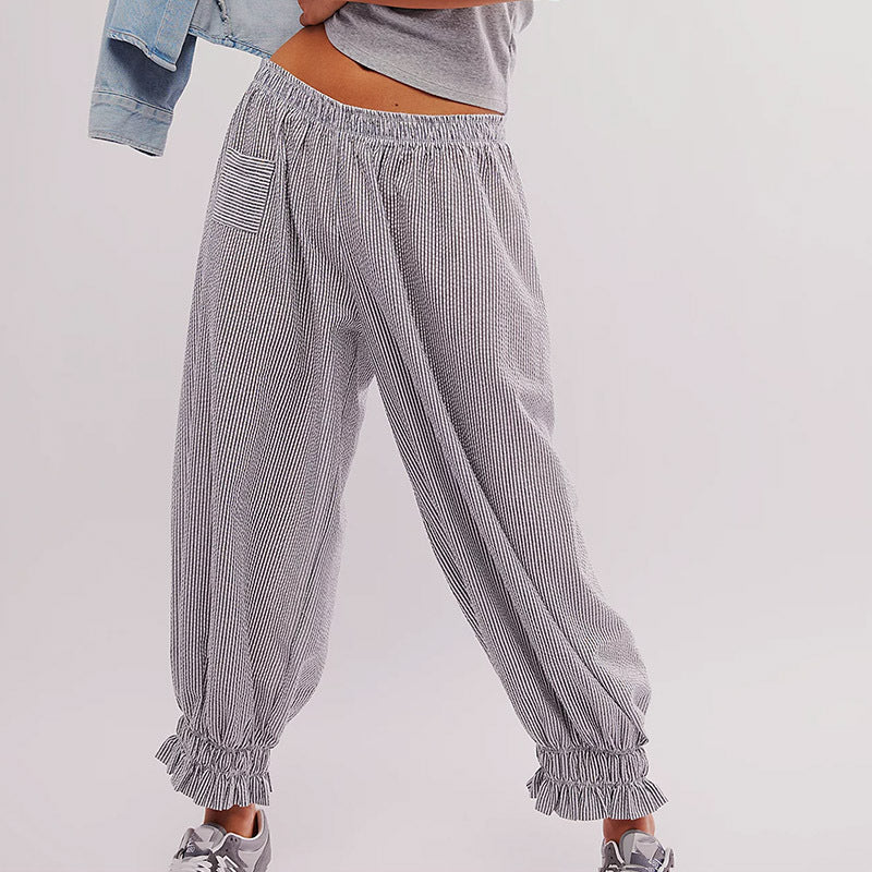 Women’s casual striped pants with elastic waistband and ruffle details Ivyshape