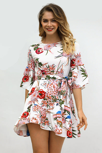 Ladies wrap dress with floral ruffle details and elegant hem Ivyshape