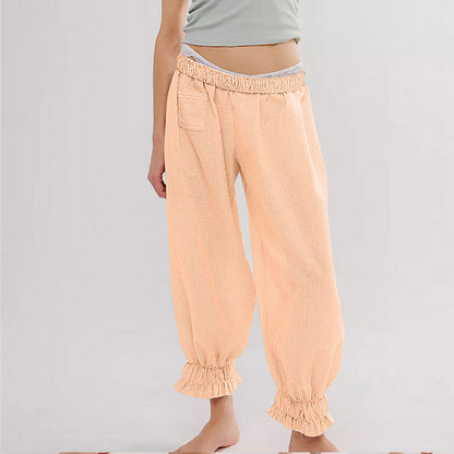 Women’s casual striped pants with elastic waistband and ruffle details Ivyshape