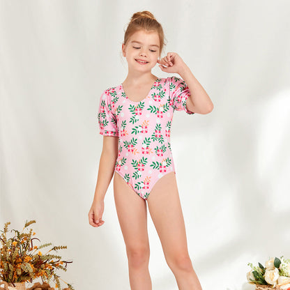 Girl's one-piece swimsuit with puff sleeves and floral design Ivyshape