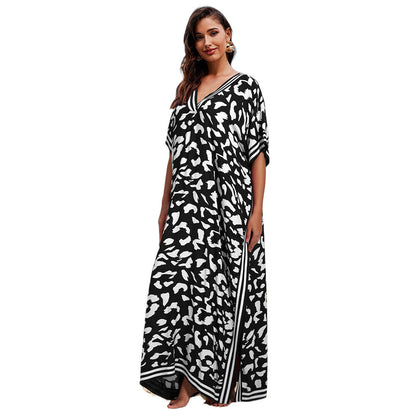 Women's maxi kaftan in a modern animal pattern with deep V-neck Ivyshape