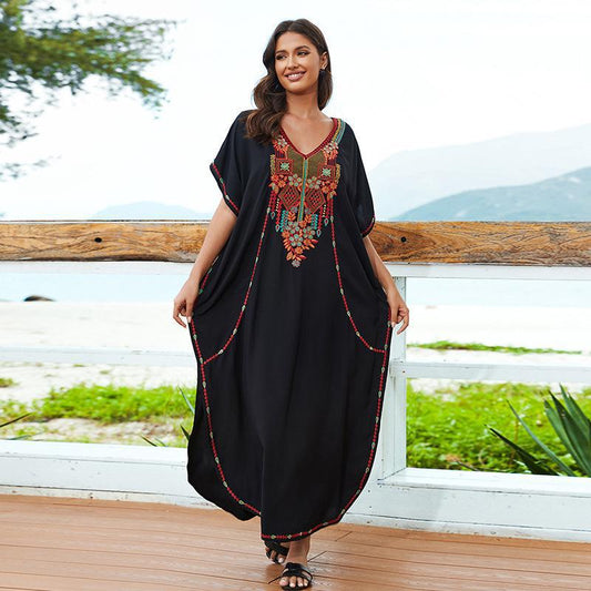 Women’s beach dress with luxurious embroidery and flowing cut Ivyshape