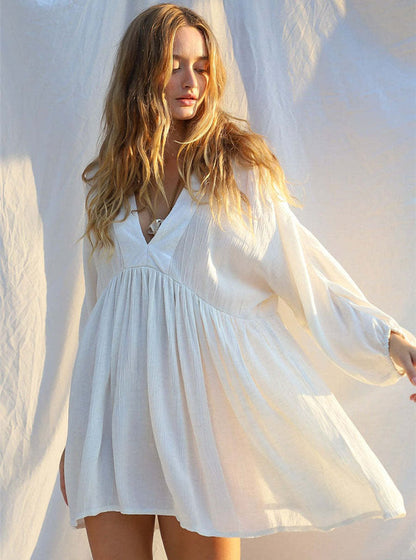 Women's casual beach dress with deep V-neckline and loose silhouette Ivyshape
