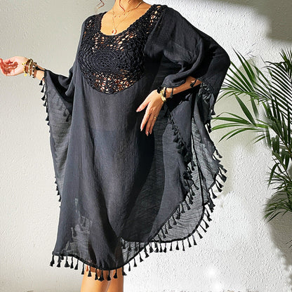 Women's lightweight beach cover-up with intricate crochet accents and fringe details Ivyshape