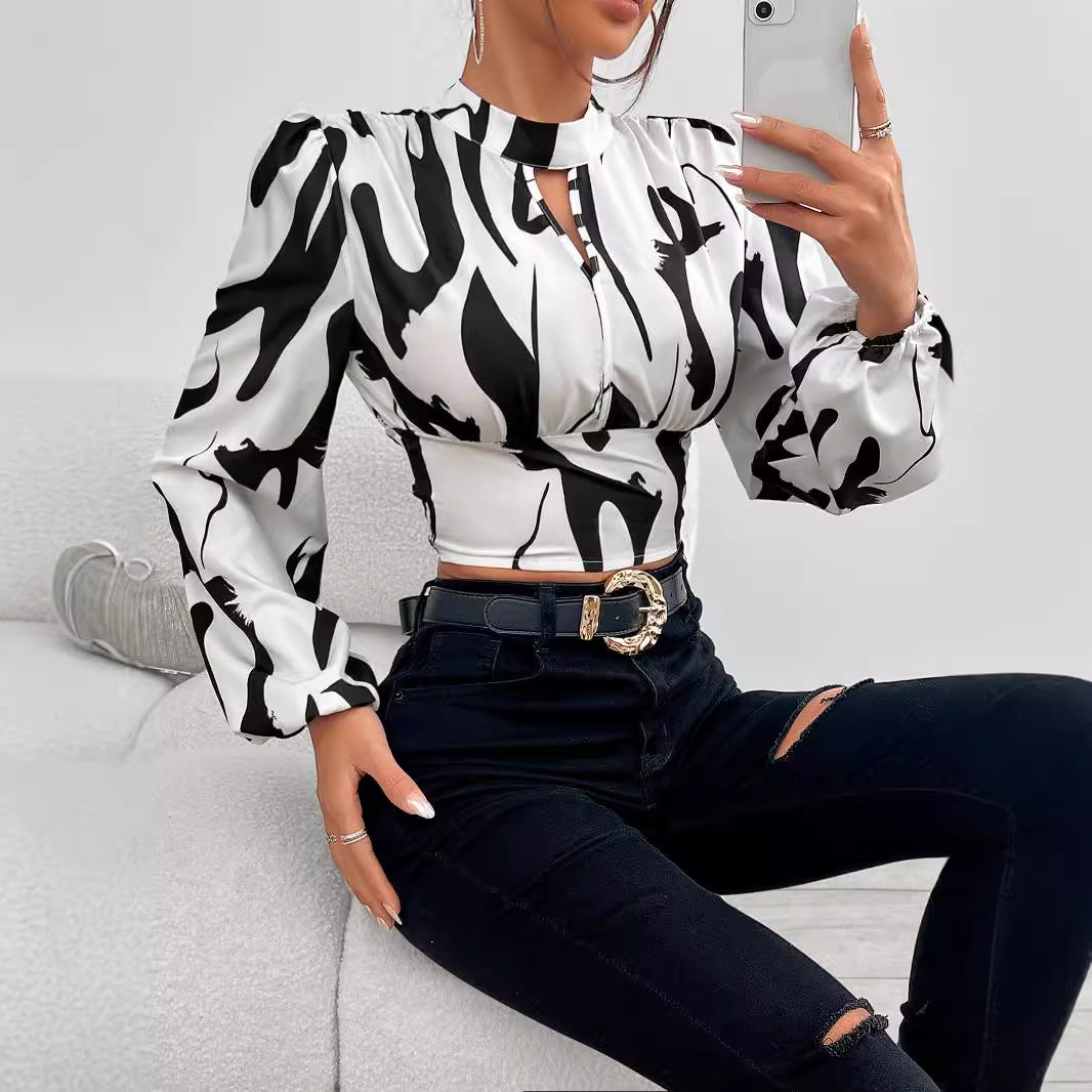 Women's blouse with voluminous sleeves and modern cut-out Ivyshape