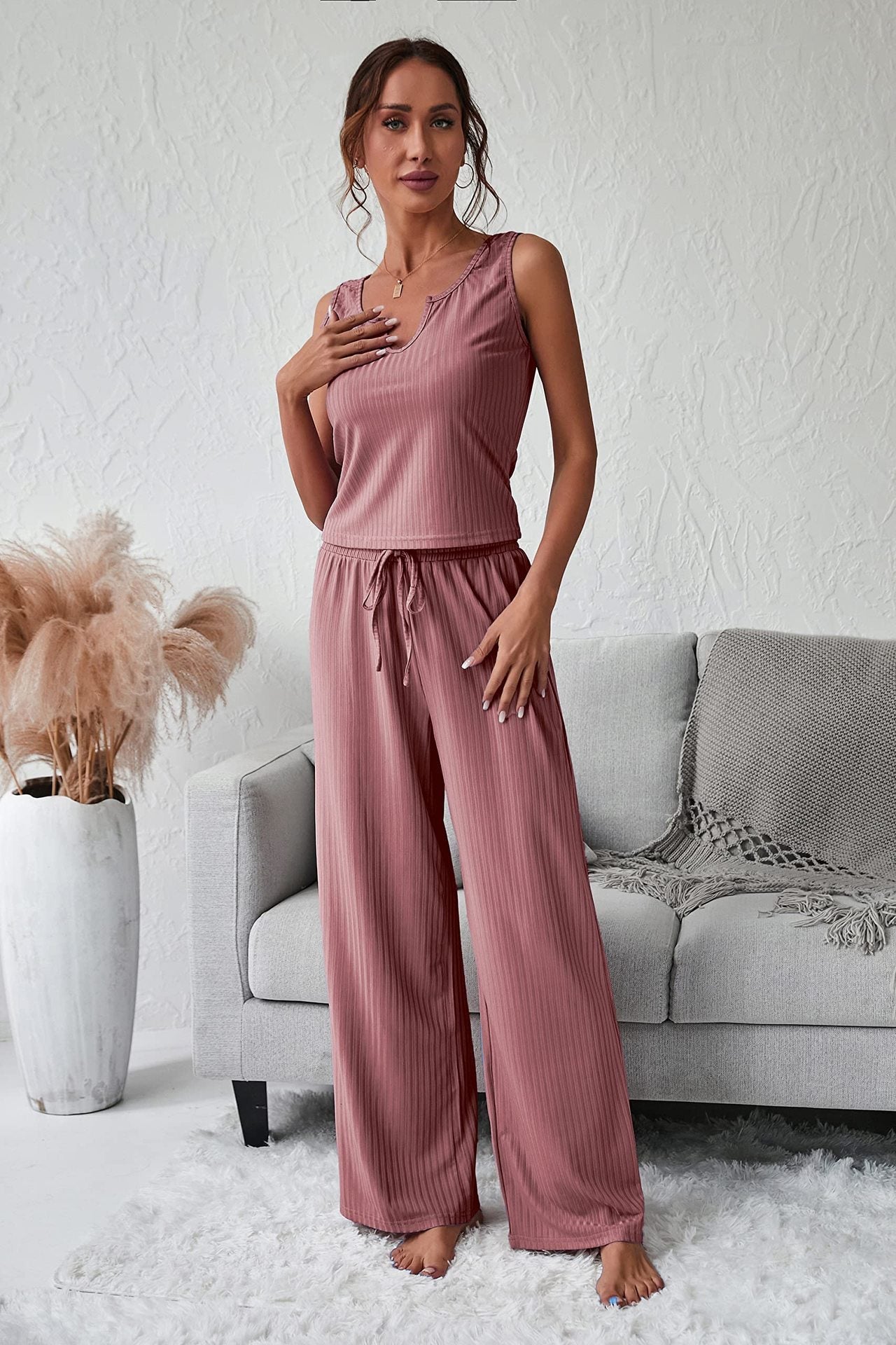 Women's jumpsuit with deep neckline and elastic waistband Ivyshape